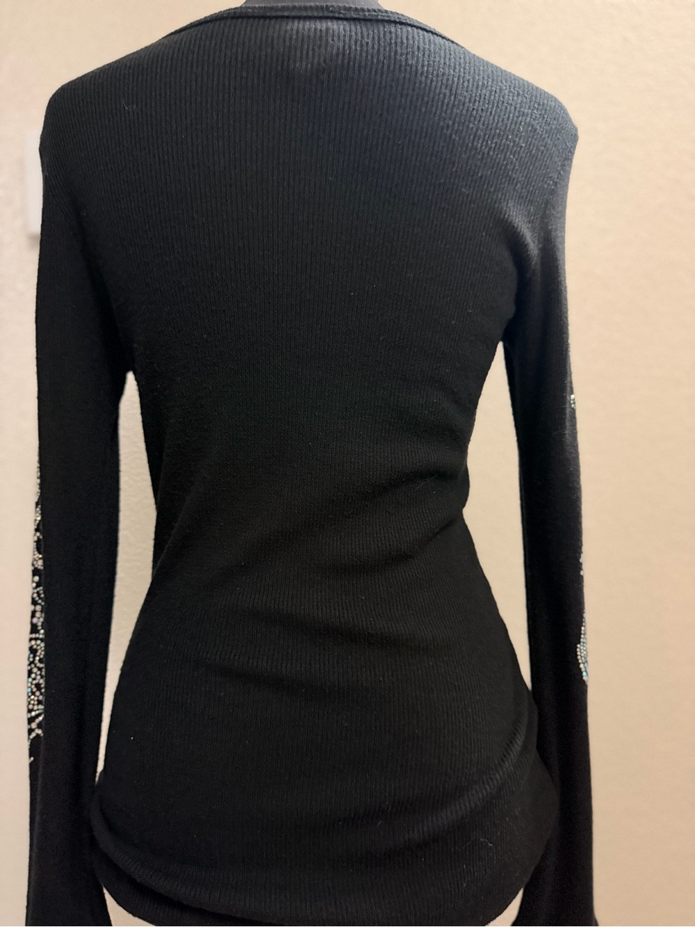 Vocal Black V-Neck Sweater with Rhinestone Fleur-de-Lis Accent - Picture 6 of 7